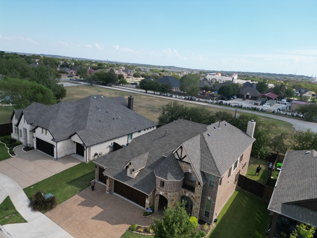 Overhead drone view of the home's new roof in its North Texas neighborhood